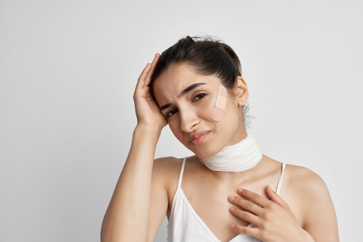 Patient experiencing pain from an untreated Facial Fracture after a facial injury